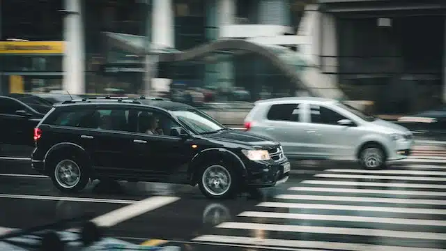 driver maintains a safe following distance in wet driving conditions