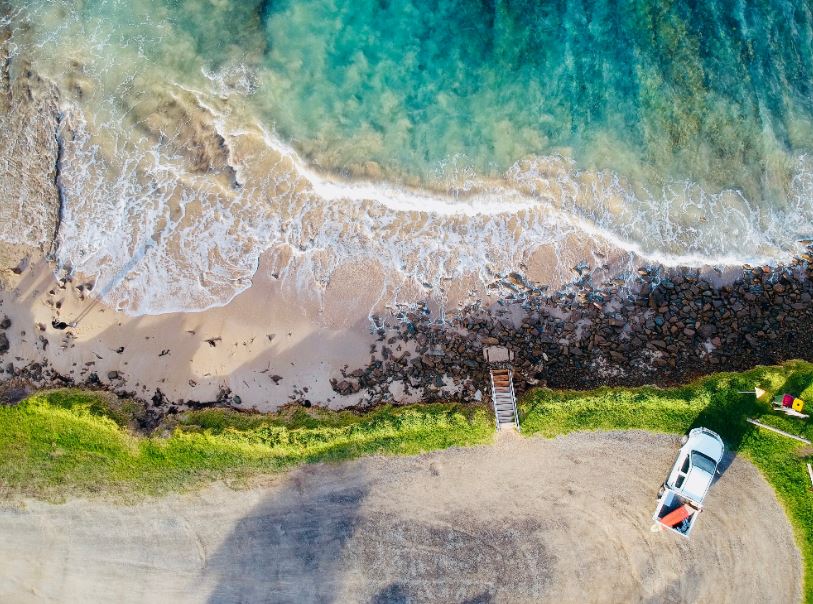 regional road trip travelling can take you to amazing coastal spots like this beach