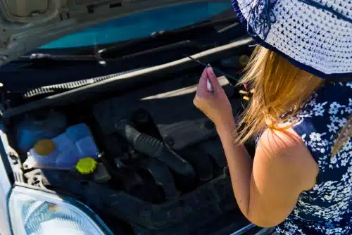 this woman knows how to check oil