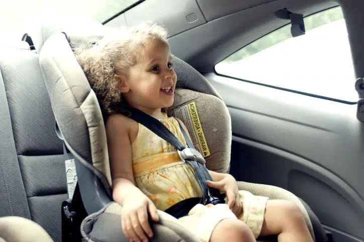 Properly fitted and fastened car seats are a legal requirement for kids up to the age of seven. 