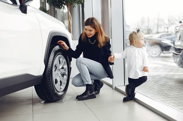 This PD Insurance customer is using her car trade in toward a down payment on her new car.