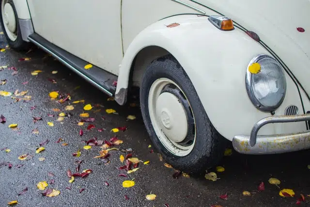 white old VW beetle - a previously popular used car choice