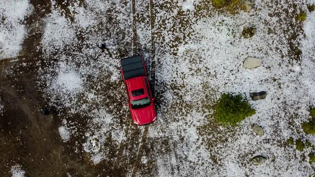Get a car hail protector - never try driving away from hail, you could have an accident.