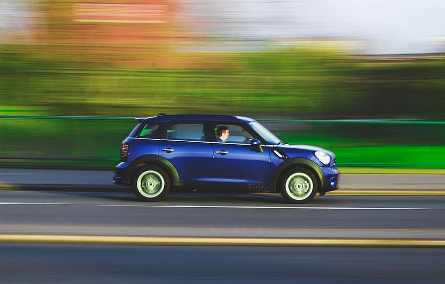 Avoid looking at fast moving objects outside the car to stop car sickness.