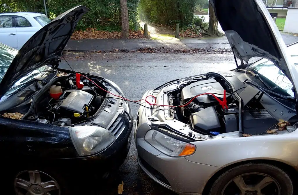 Fix your car battery with jumper cables. 
