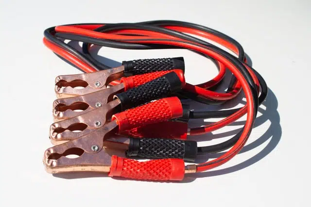 Jumper cables to jump start a car