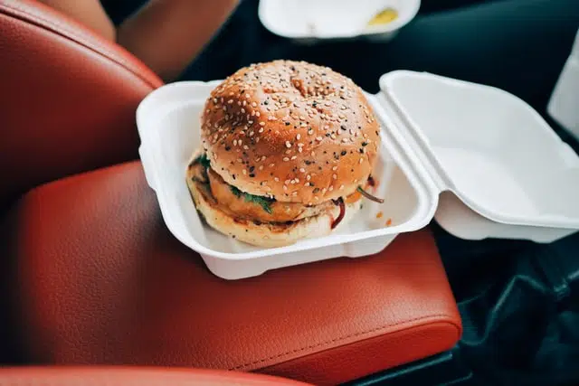 Is it illegal to eat while driving in all states and territories?