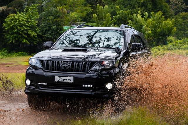 Toyota land cruiser in water - Toyota is the most reliable car brand