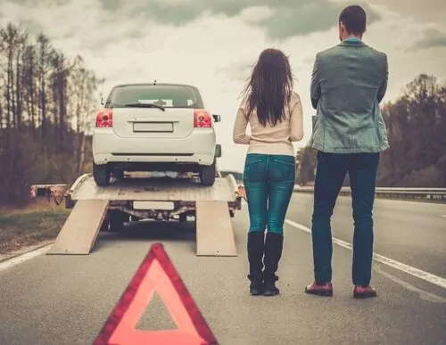 does car insurance cover towing? This couple's plan does, so they know what to do after a car accident