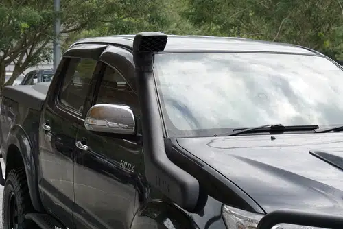black ford hilux car with snorkel for going through water