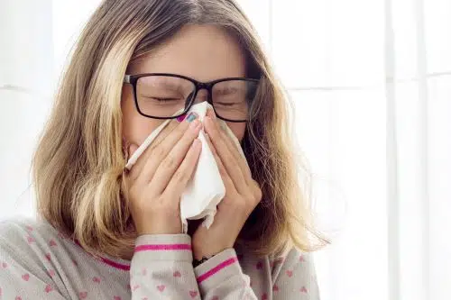 girl sneezes