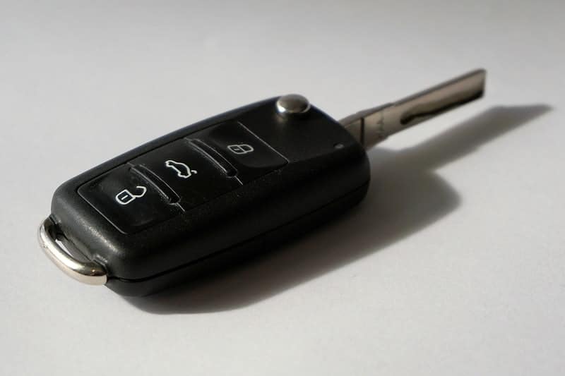 A switchblade key that may be needed by an auto locksmith for a car key replacement