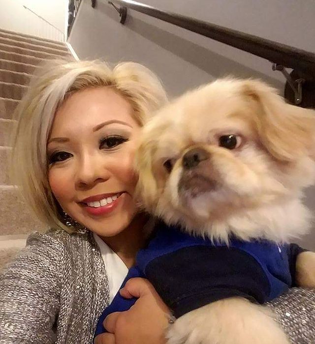 a woman and her dog. she's one of the people who look like their dogs