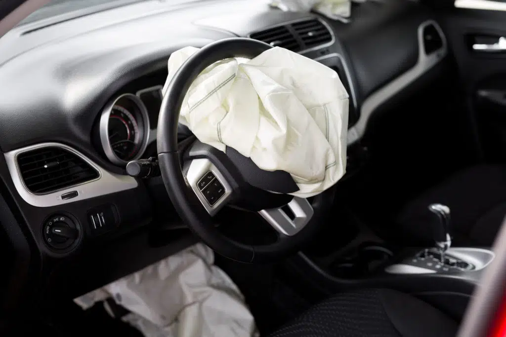 This image shows an airbag exploded at a car accident. The safest electric cars have air bags