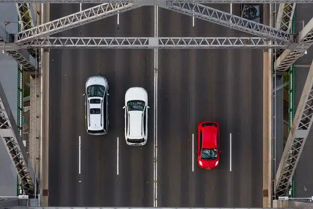 ANCAP safety ratings help the auto industry compete to make better safety features for the national fleet, as exampled by these three cars crossing a bridge