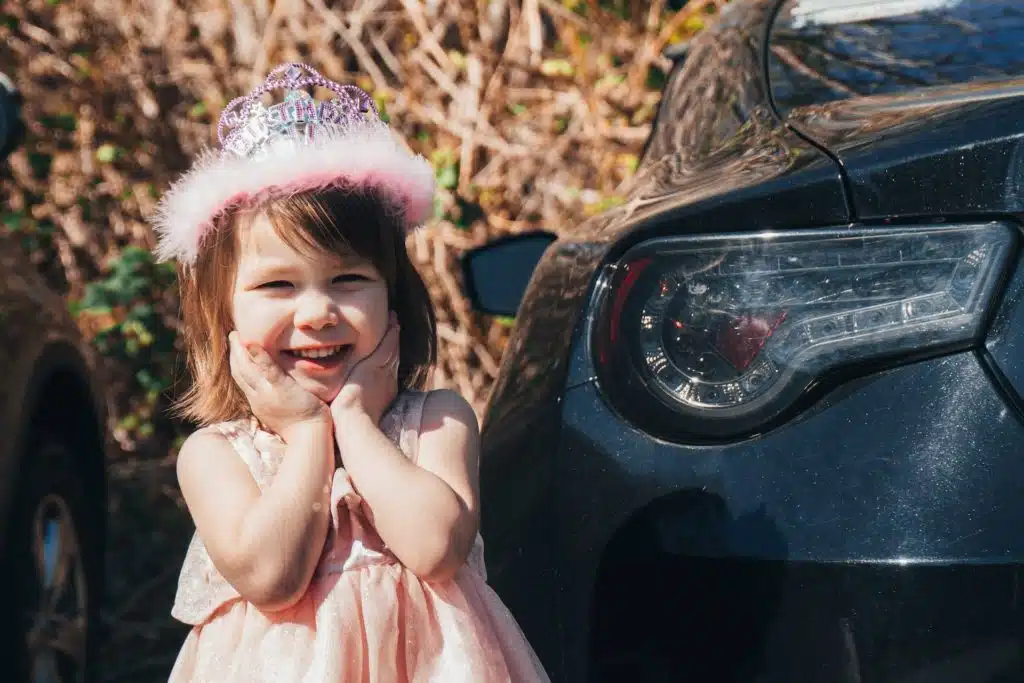 New ANCAP safety ratings include child presence detection, like this girl in a pink dress next to a black car