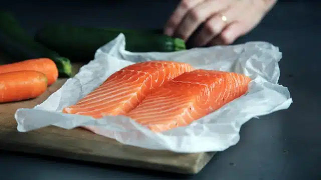salmon is high in omegas that are good for dogs' skin and coats
