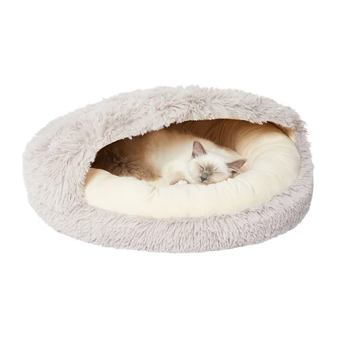 This Plush Faux Fur Cocoon by All Day will help your cat sleep like a dream. 