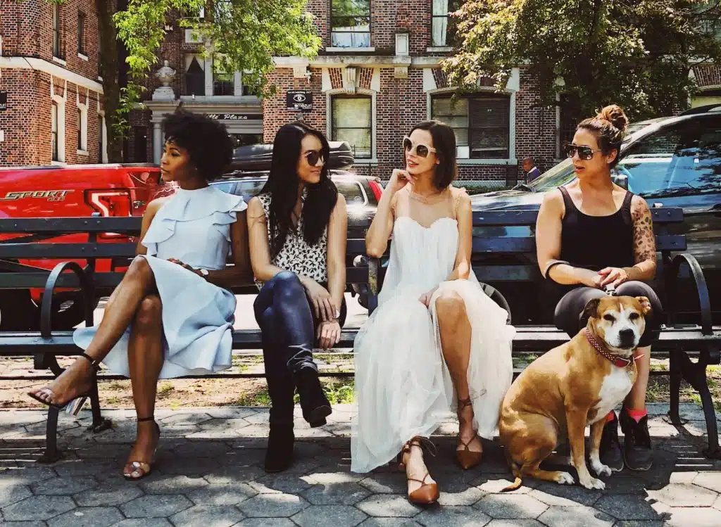 dog with owner and owner's circle of friends