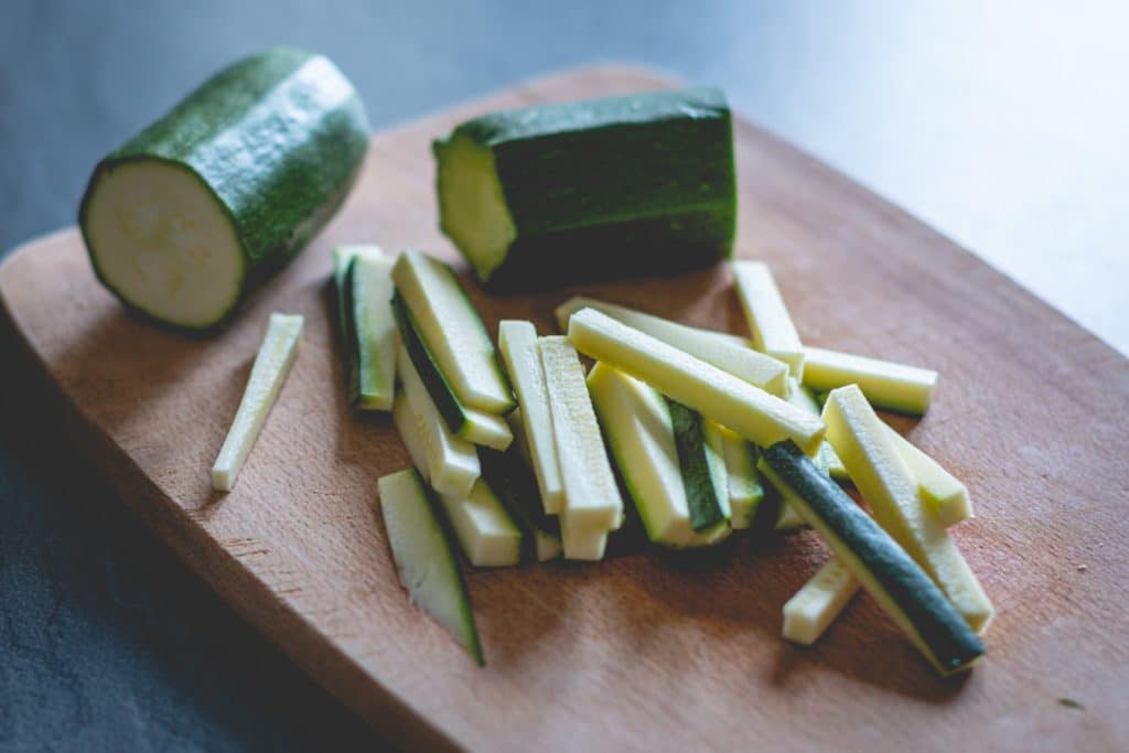 This chopped Zucchini is a perfect treat for an overweight dog.