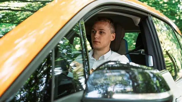 PD member in yellow car