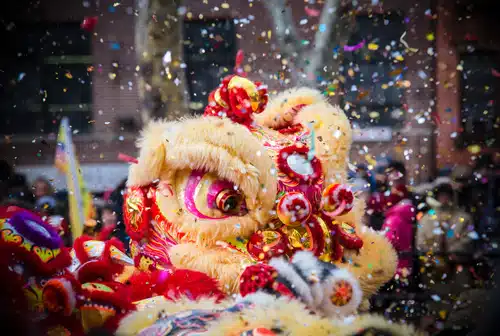 Confetti falling from the sky at a Chinese New Year celebration.