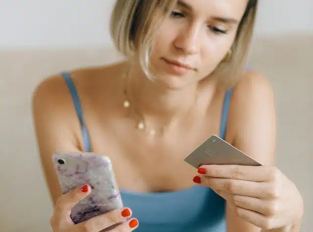 Women does a car rego check then pays the annual fee online