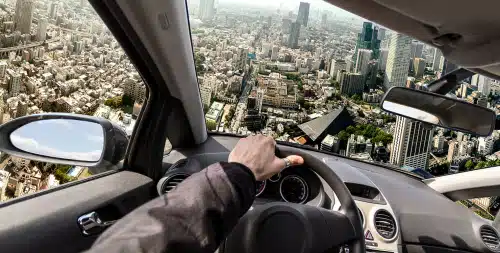 Driving a flying car to solve traffic problem, photo manipulation