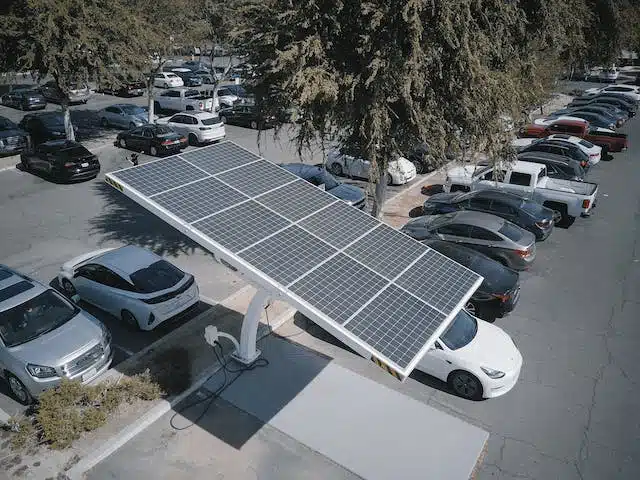 A solar panel supplies electric cars with energy which will come in handy for the ban on petrol and diesel cars 