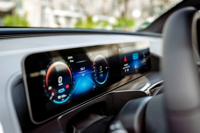 The car dashboard featuring an updated digital display - a vehicle modification that needs to be made as part of your duty of disclosure