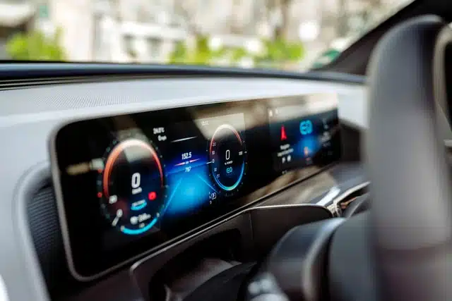 The car dashboard featuring an updated digital display - a vehicle modification that needs to be made as part of your duty of disclosure